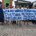 64955aac57ec4-warga-perumahan-dmutiara-residence-menolak-pembangunan-sutt_banten